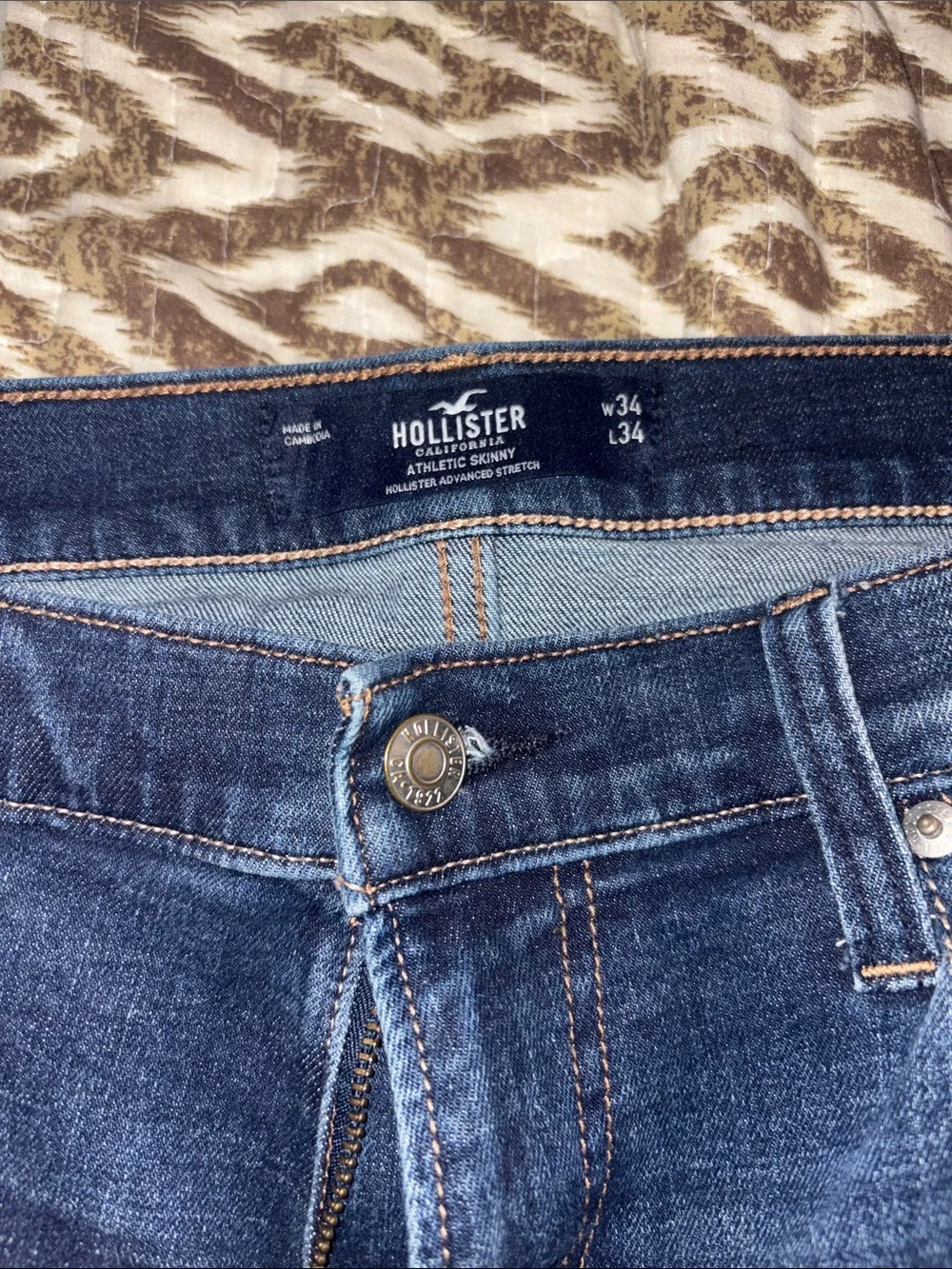 Hollister Men's Dark Blue Patchwork Athletic Skinny Jeans. 34x34